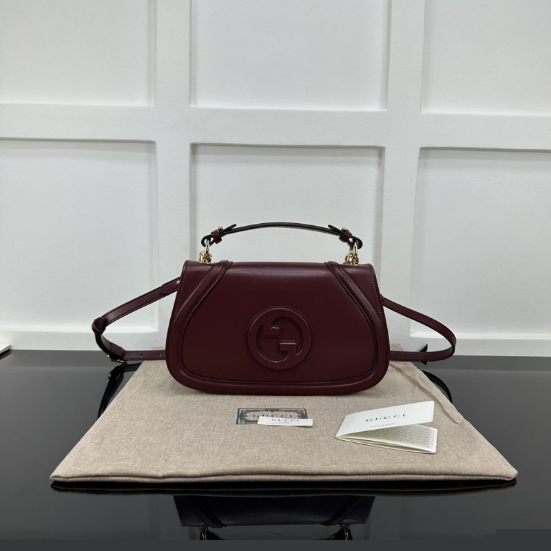 G*u*i top handle bags